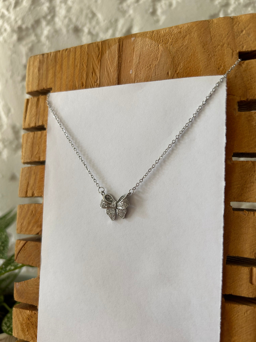 collar moño brilloso