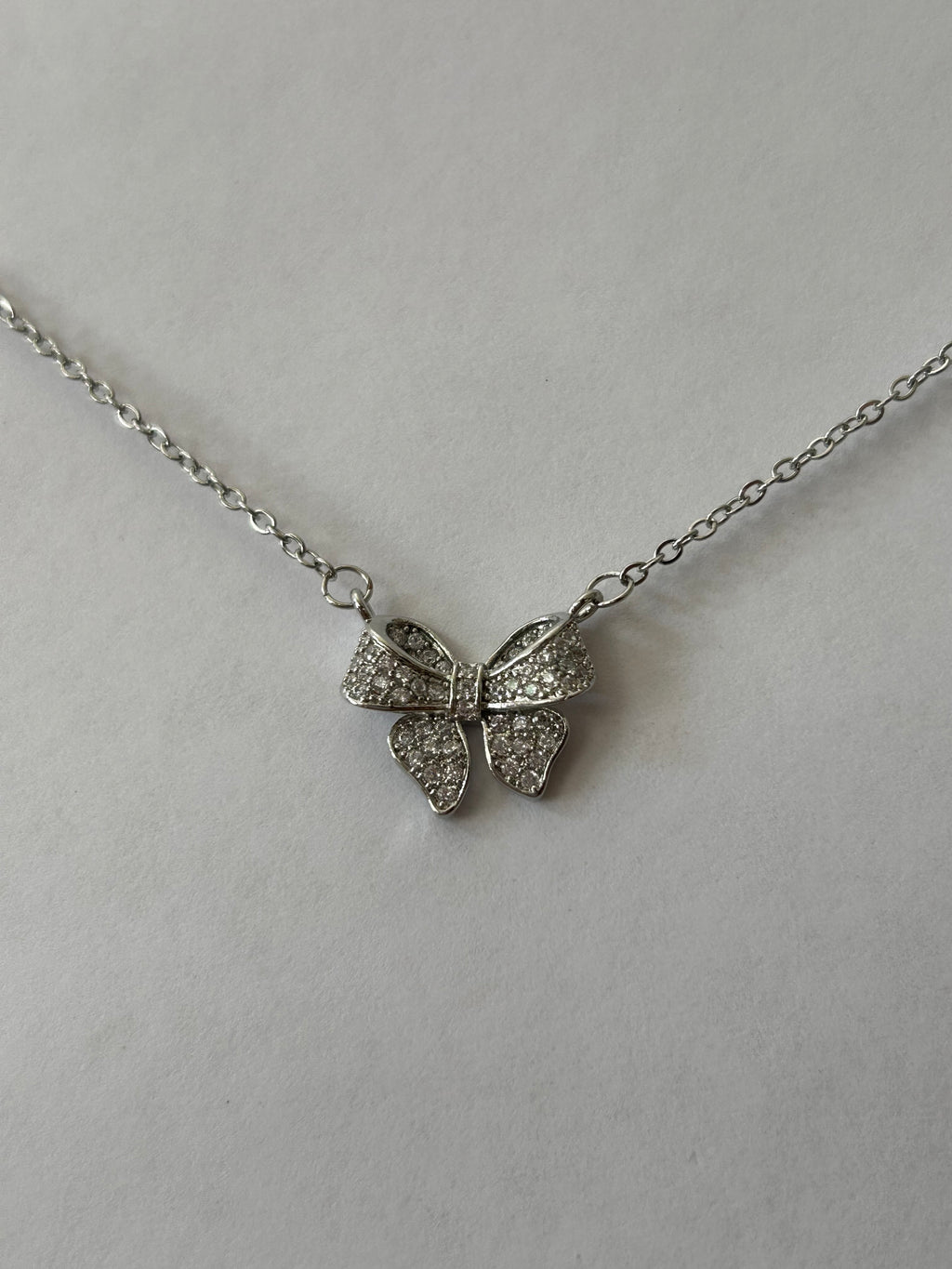 collar moño brilloso