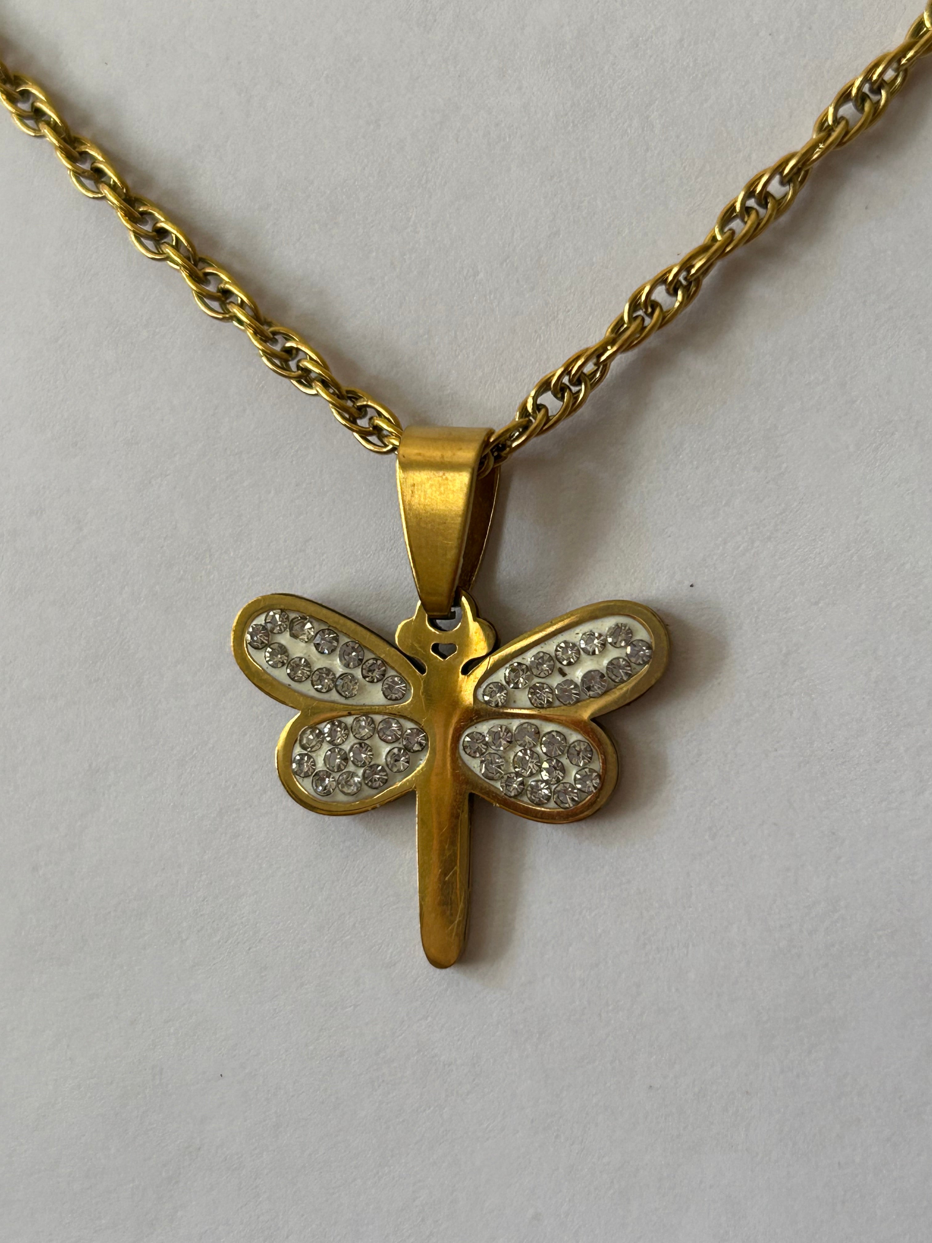 collar dorado de libelula