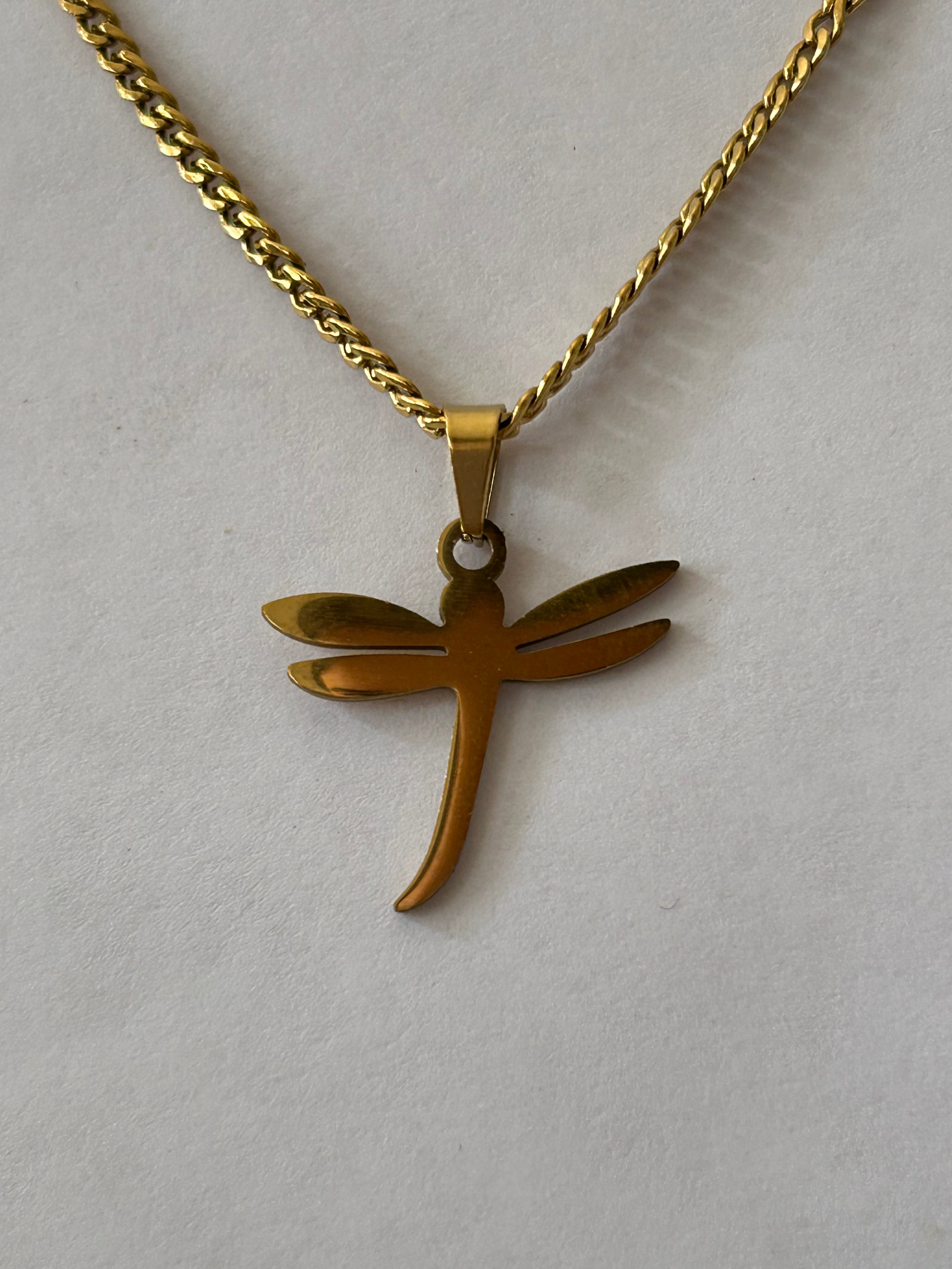 collar dorado de libelula